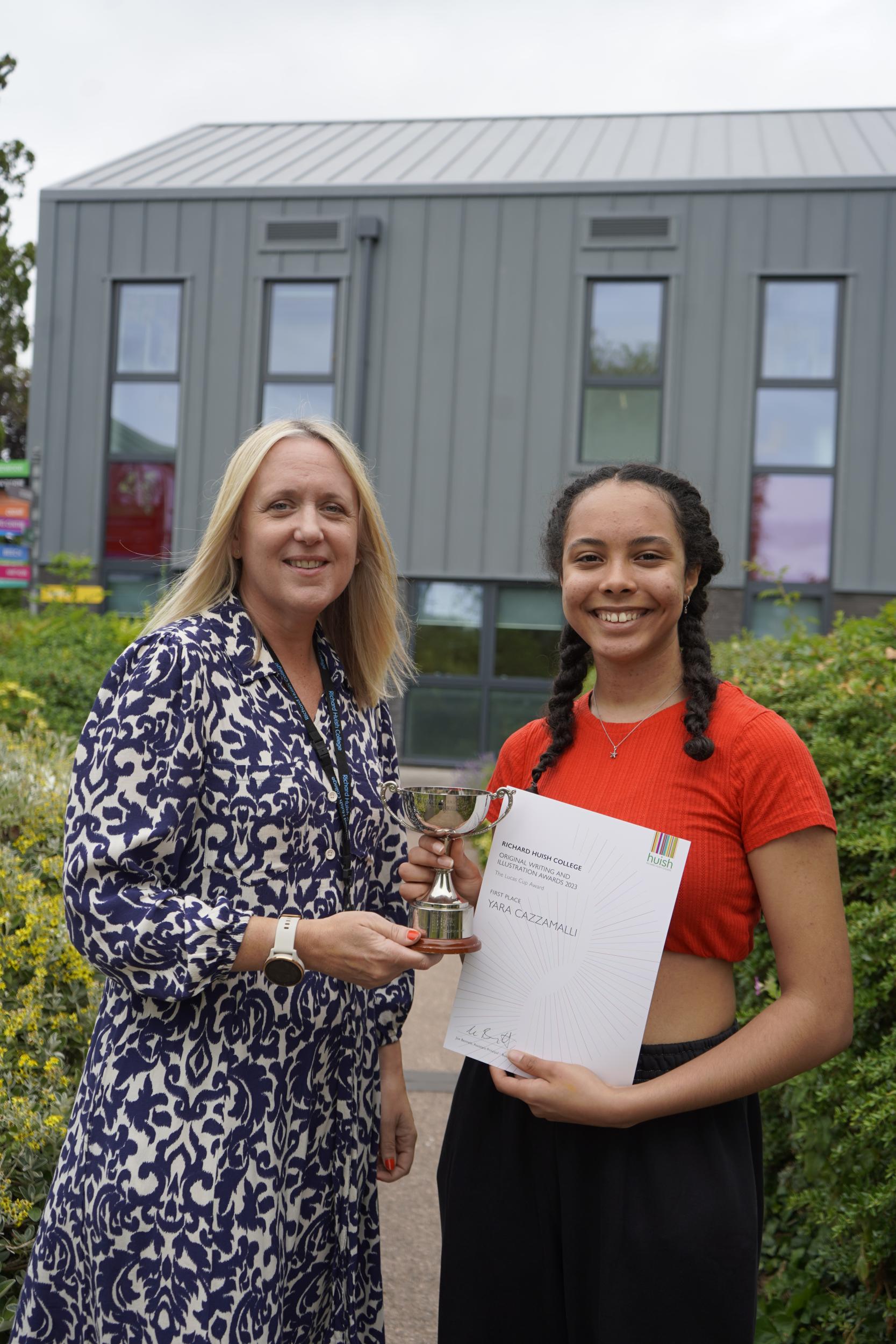 Yara Cazzamalli collecting certificate and trophy from Becky Flower