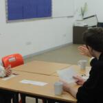 Two doctors running a practice interview with a Huish student hoping to study medicine at university.