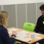 Two doctors running a practice interview with a Huish student hoping to study medicine at university.