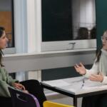 A doctor runs a practice interview with a Huish student hoping to study medicine at university.