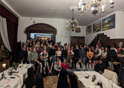 A group of students at a Polish restaurant, as part of their trip to Kraków.