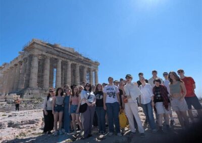 Students in front of greek monument