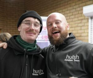 Two members of the estates team smiling