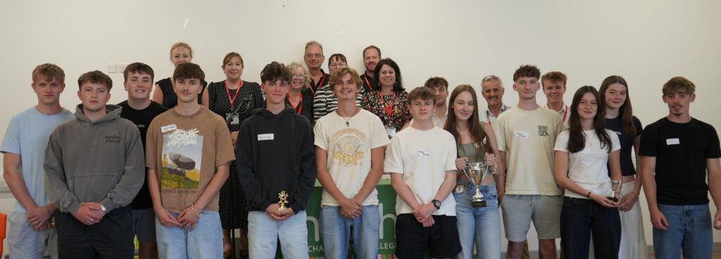 The winning students with the taunton chamber panel. Winners hold their trophies
