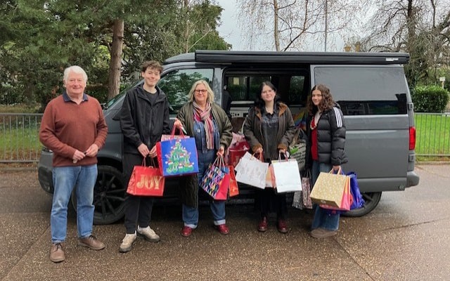 Arc collecting bags from staff and students