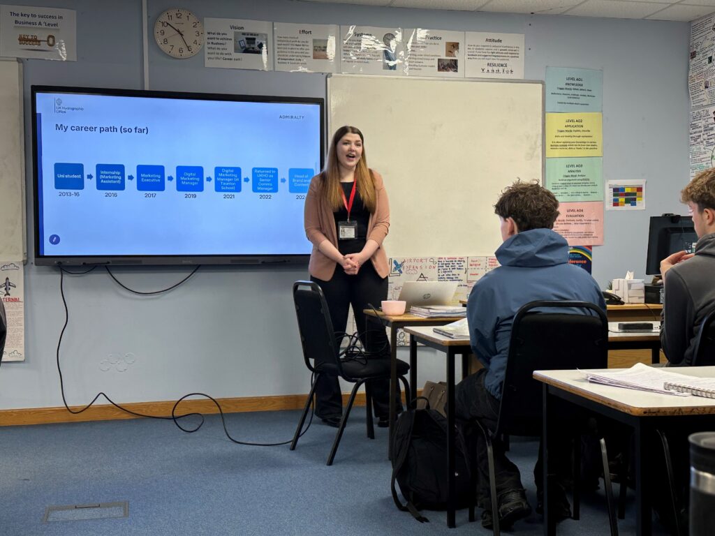 Speaker from the Hydrographic Office talking to students