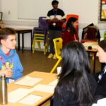 boy talking to women