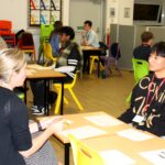 student talking to doctor