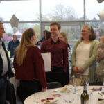 Students and parents chatting at prizegiving.