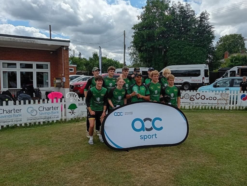 Cricketers stood by AOC Sport sign