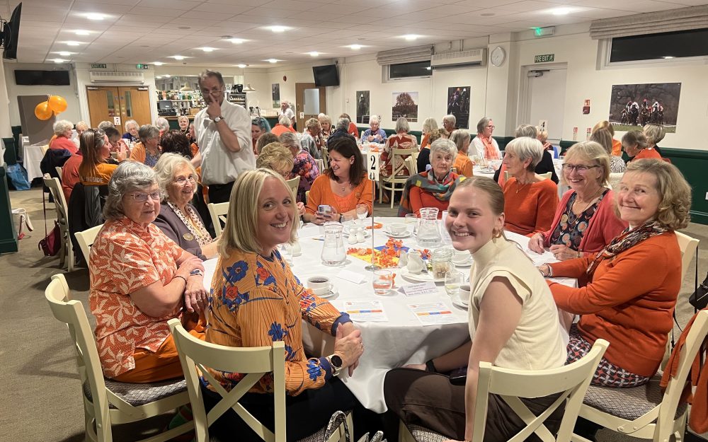 Becky and Teagan sat with attendees of event