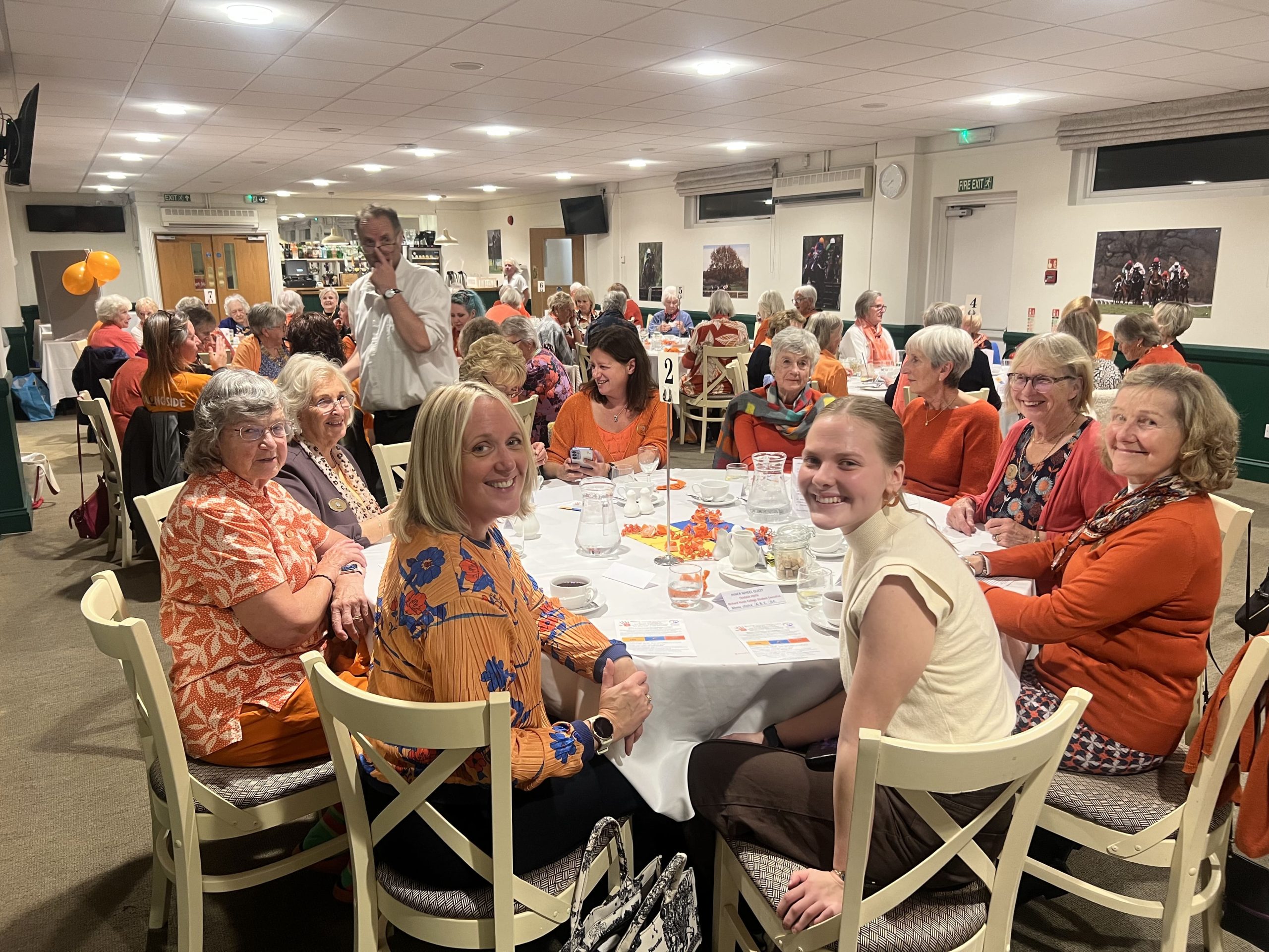 Becky and Teagan sat with attendees of event